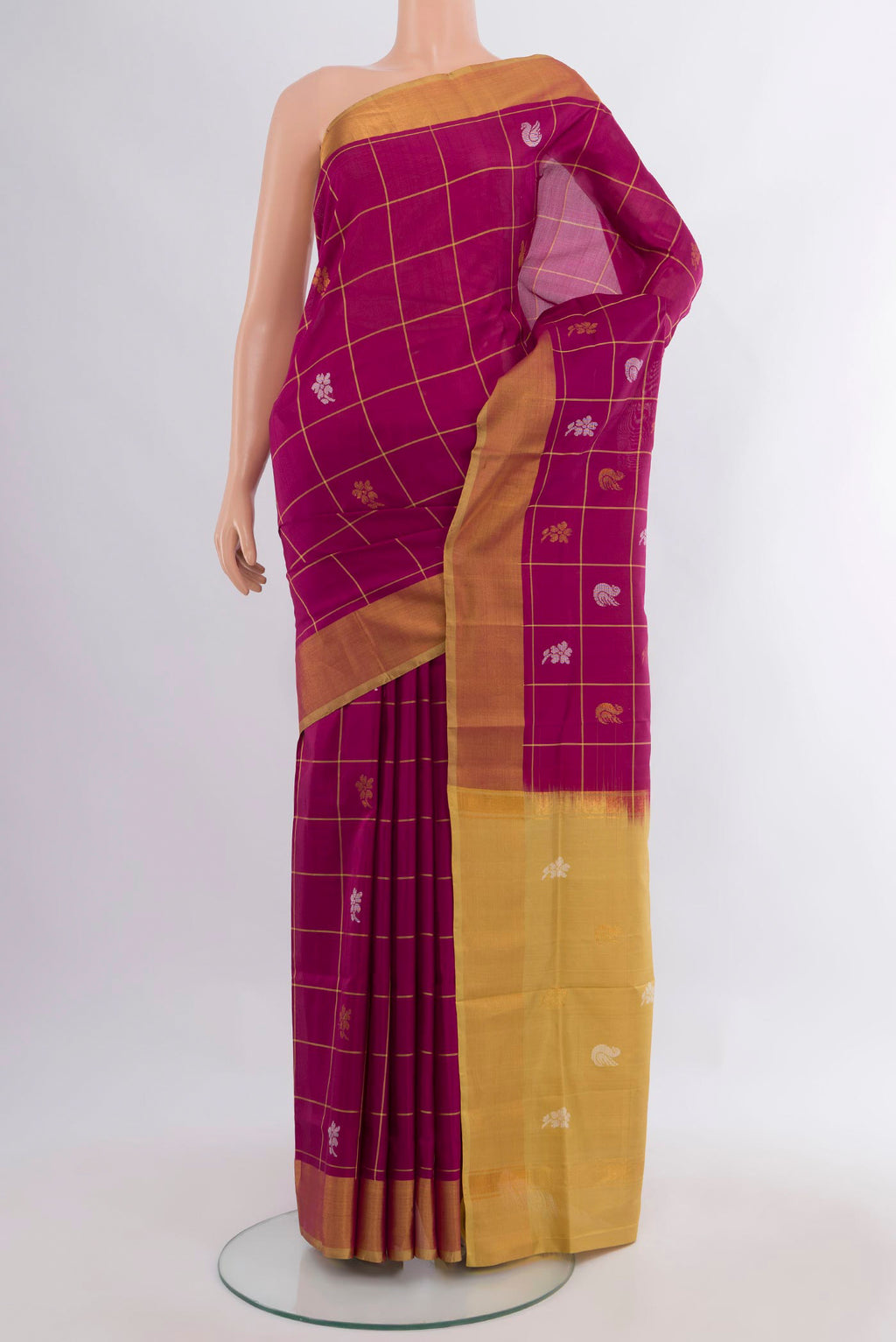 Pure Silk Magenta Uppada Saree with Zari Butta on the body and Zari Border.  displayed on a mannequin