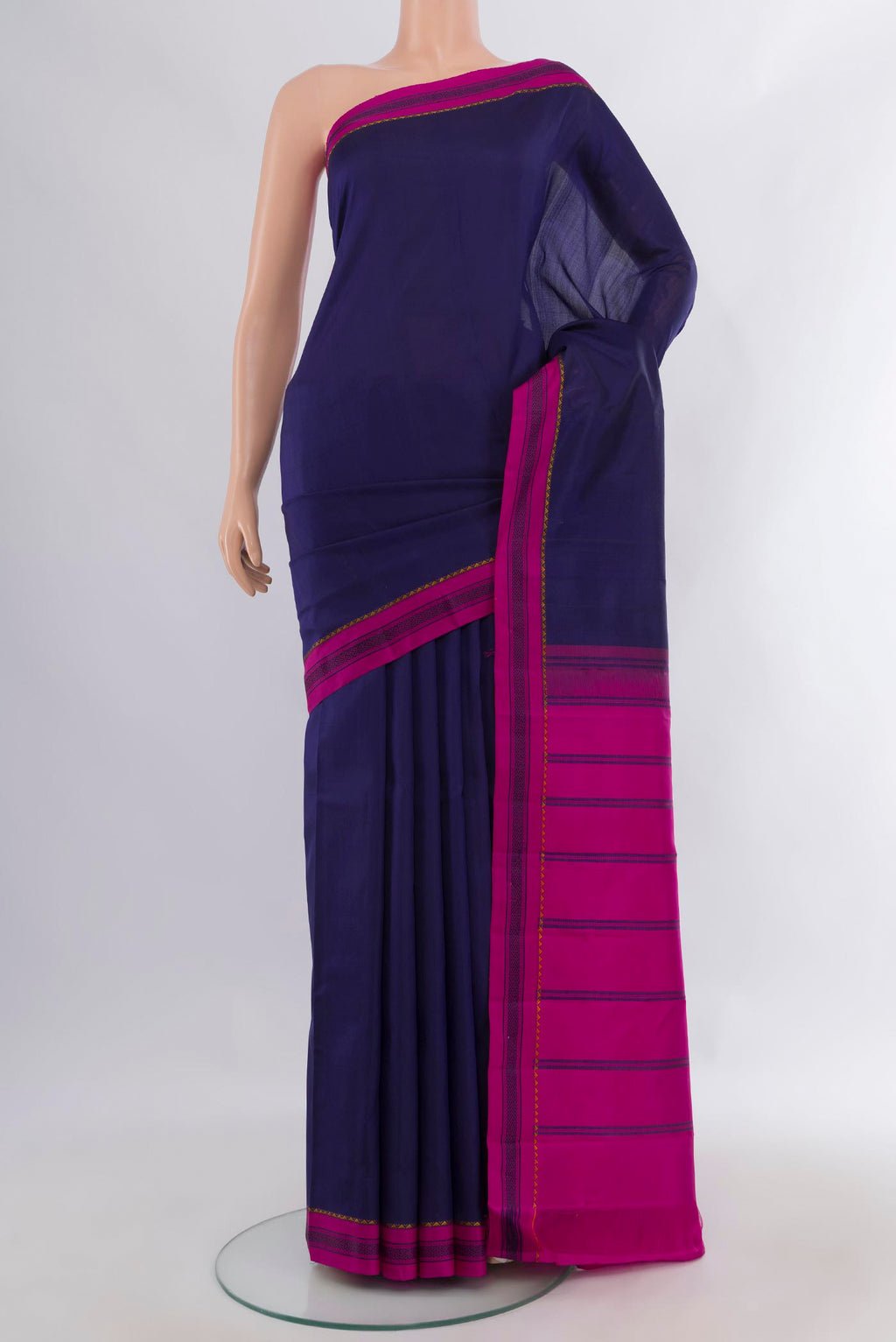 Pure Silk Navy Blue Kanjivaram Saree with Plain Body and Thread Border.  displayed on a mannequin