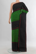 Pure Silk Green Kanjivaram Saree with Checked design on the body and Plain Border.  displayed on a mannequin