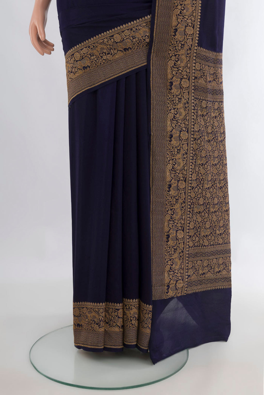 Pleats and pallu of Navy Blue Banarasi Georgette Saree with Plain Body and Zari Border. 