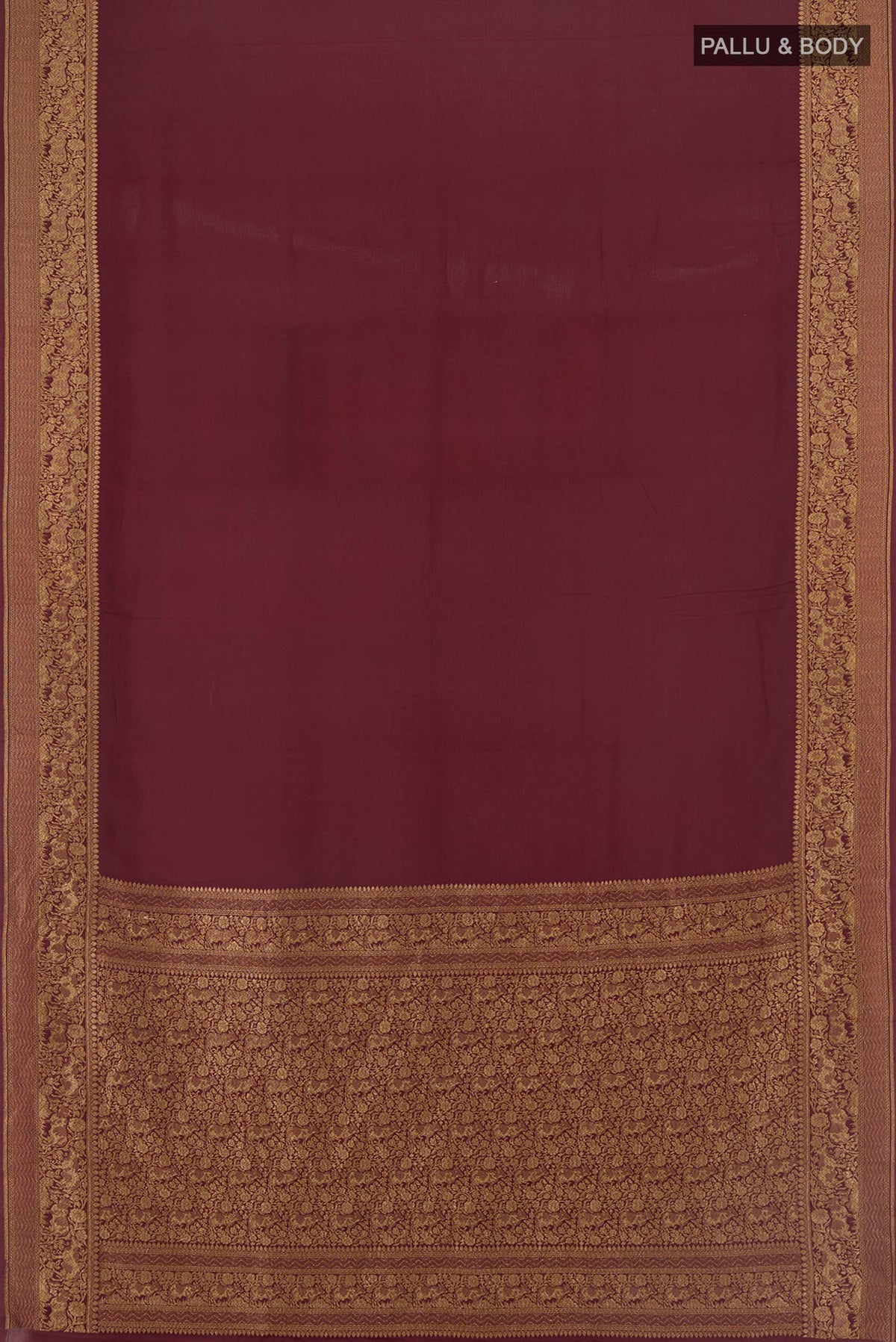 Flat view of Maroon Banarasi Georgette Saree with Plain Body and Zari Border. 