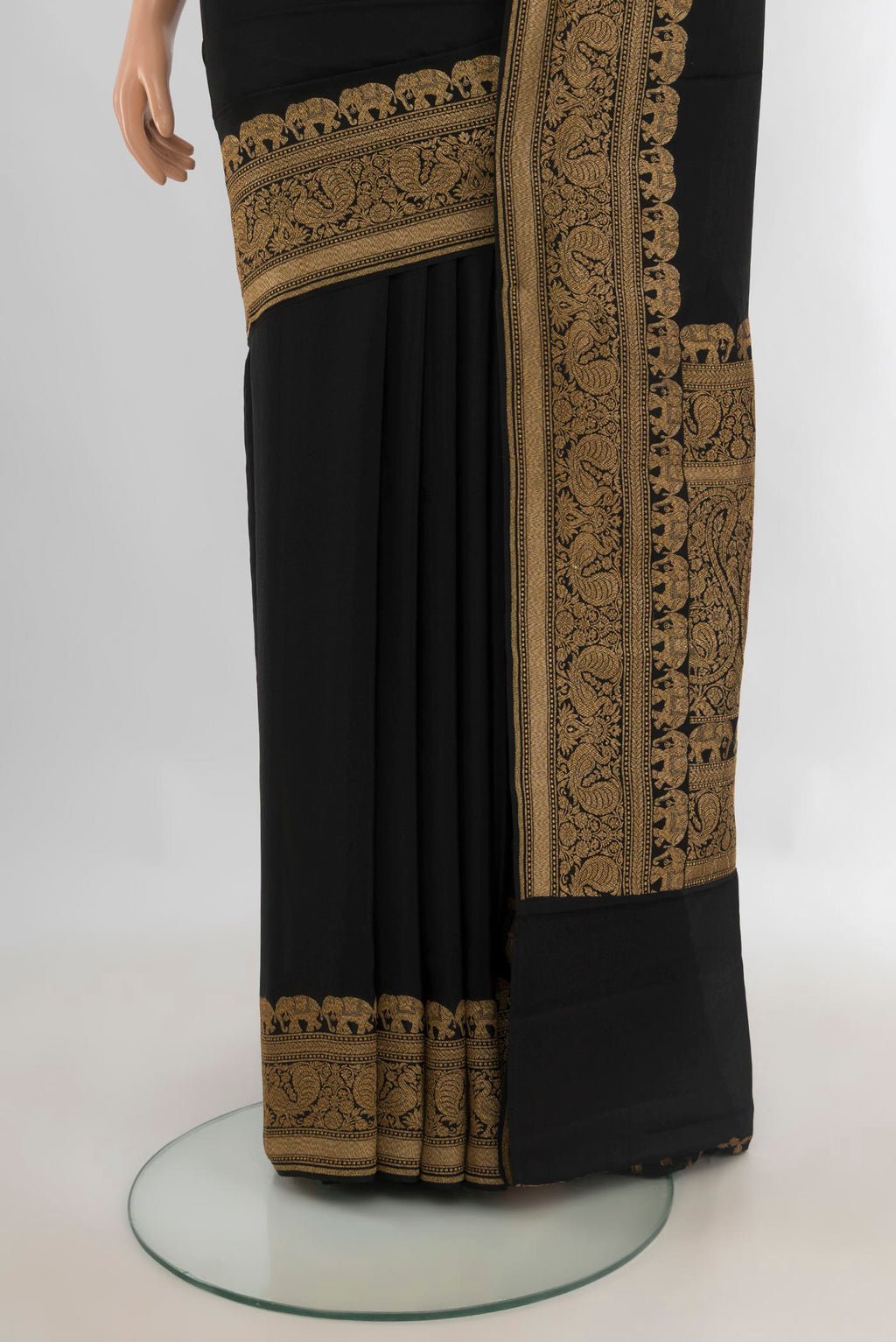 Pleats and pallu of Black Banarasi Georgette Saree with Plain Body and Zari Border. 