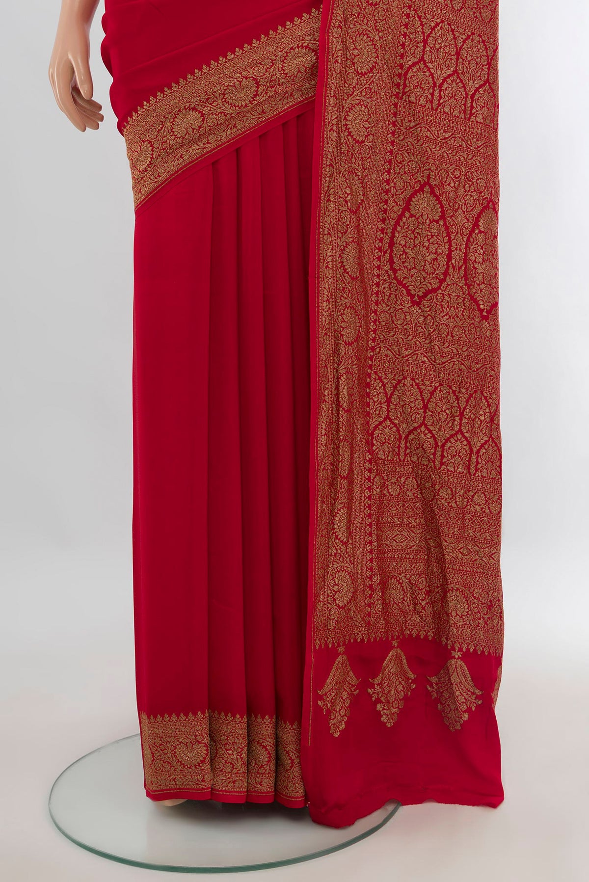Pleats and pallu of Red Banarasi Georgette Saree with Plain Body and Zari Border. 