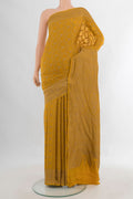 Mustard Banarasi Georgette Saree with Zari Brocade on the body and Zari Border.  displayed on a mannequin