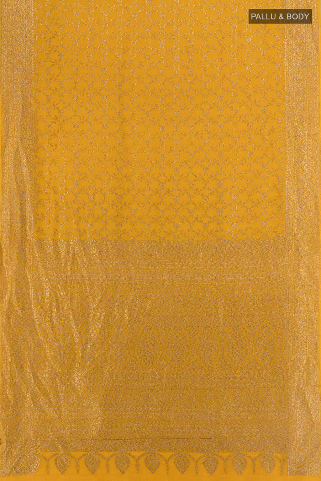 Flat view of Mustard Banarasi Georgette Saree with Zari Brocade on the body and Zari Border. 