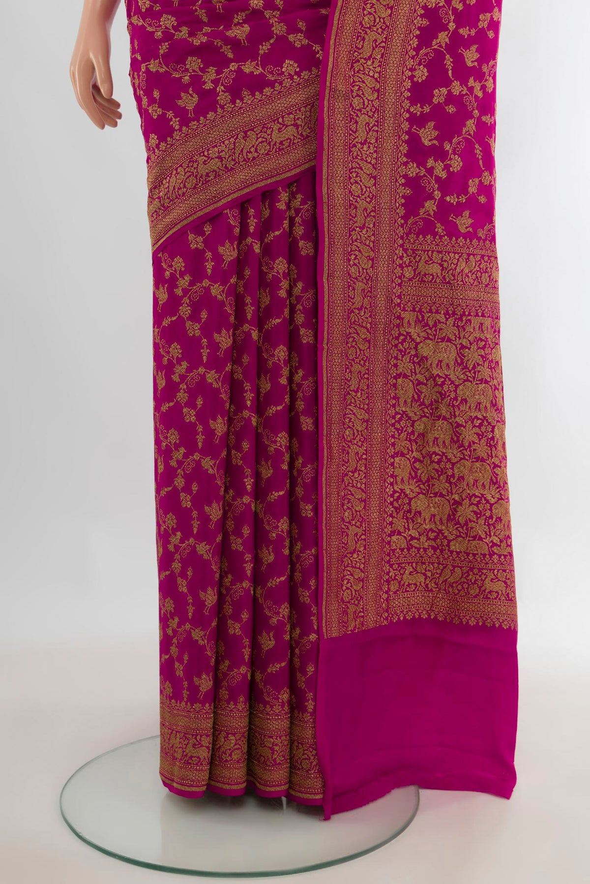 Pleats and pallu of Pink Banarasi Georgette Saree with Zari Brocade on the body and Zari Border. 