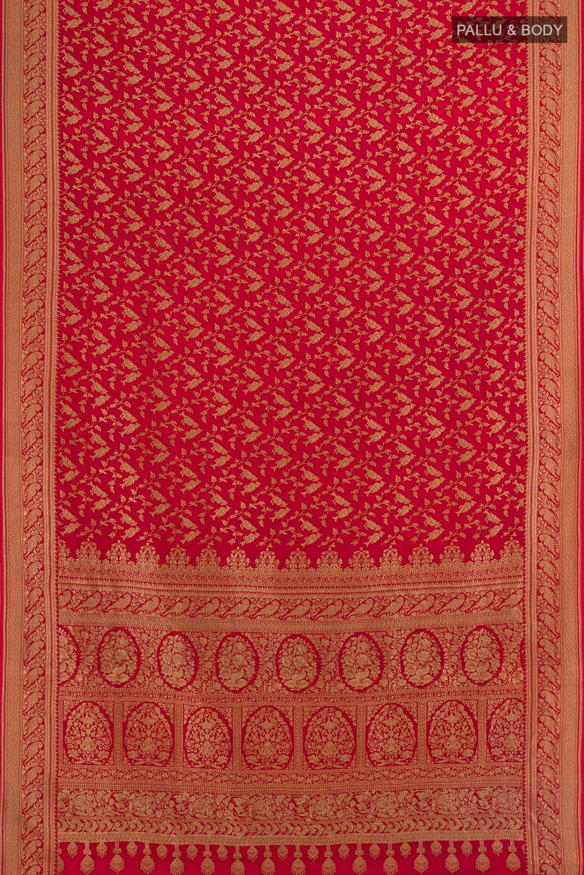 Flat view of Red Banarasi Georgette Saree with Zari Butta on the body and Zari Border. 