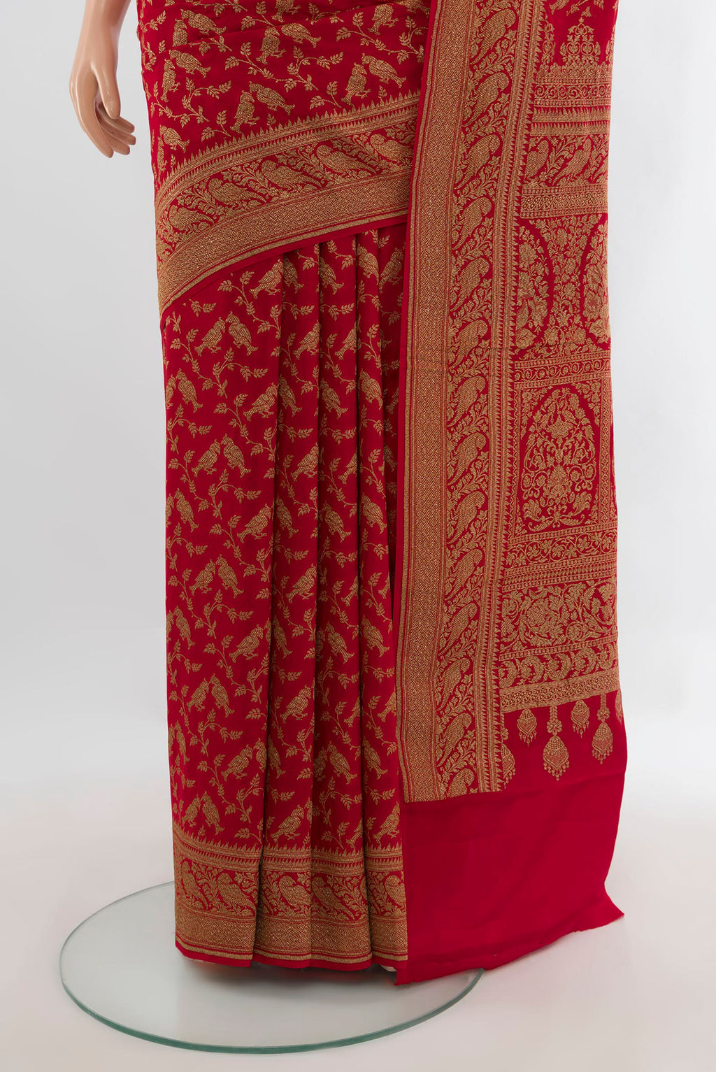 Pleats and pallu of Red Banarasi Georgette Saree with Zari Butta on the body and Zari Border. 