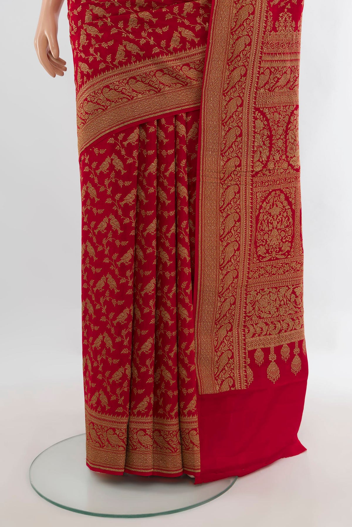 Pleats and pallu of Red Banarasi Georgette Saree with Zari Butta on the body and Zari Border. 