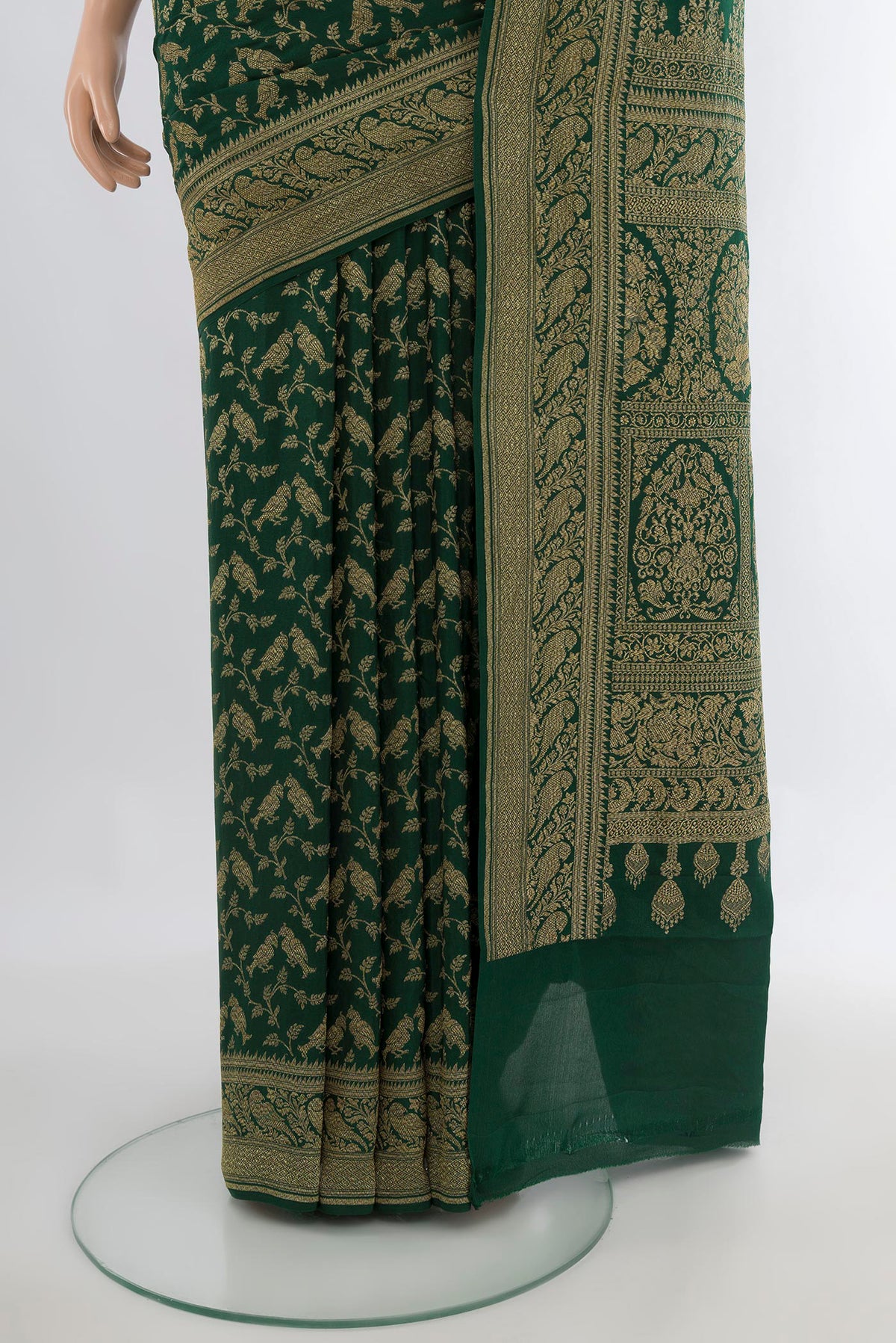Pleats and pallu of Bottle Green Banarasi Georgette Saree with Zari Brocade on the body and Zari Border. 