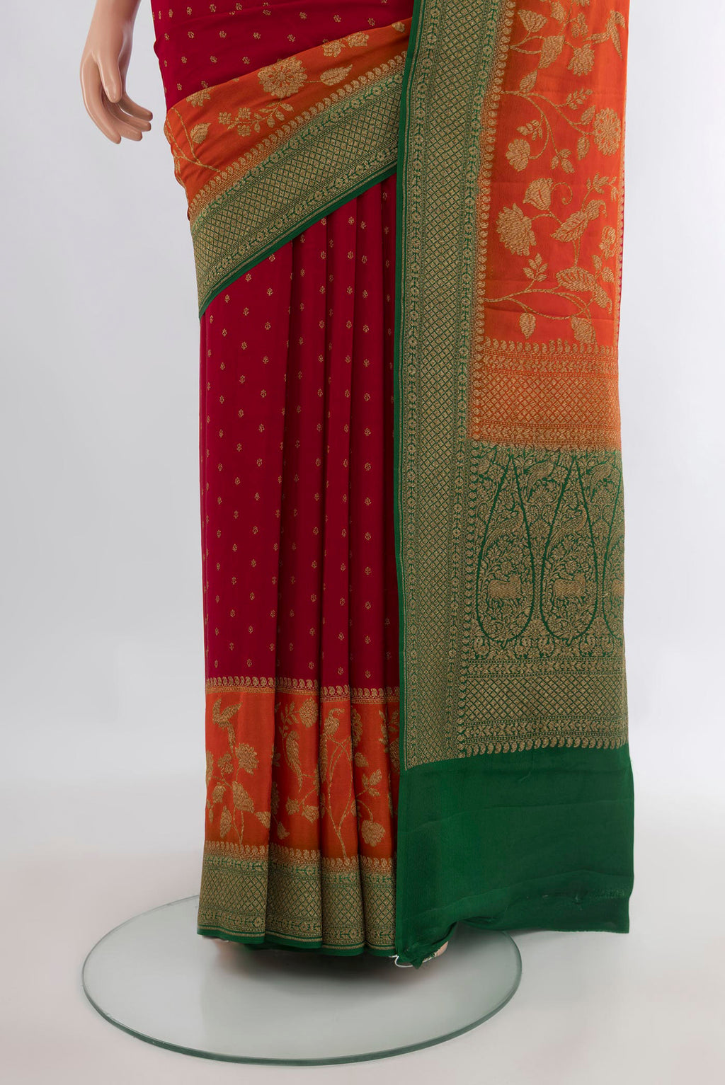 Pleats and pallu of Red Banarasi Georgette Saree with Zari Butta on the body and Zari Border. 