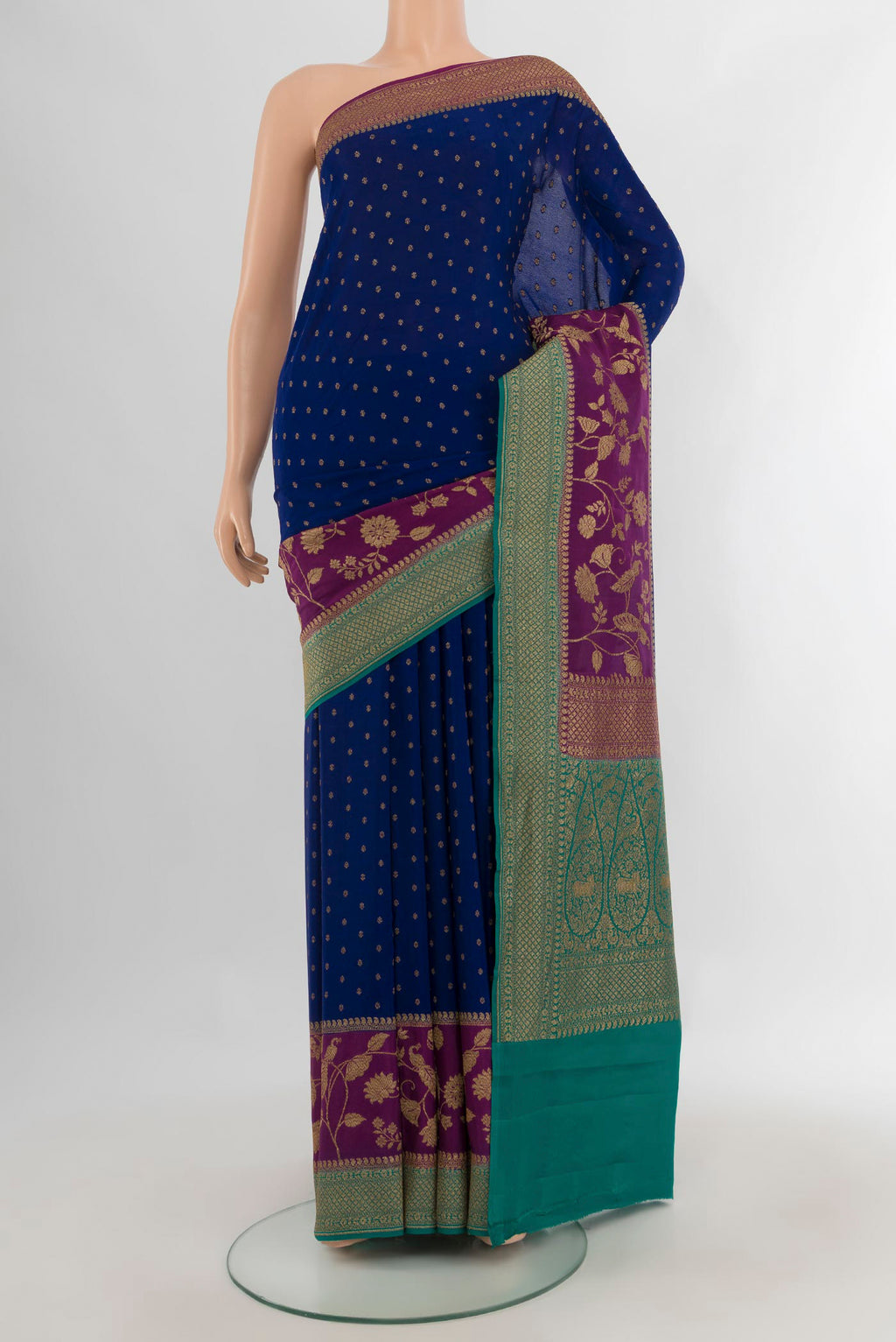 Blue Banarasi Georgette Saree with Zari Butta on the body and Zari Border.  displayed on a mannequin