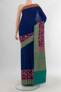 Blue Banarasi Georgette Saree with Zari Butta on the body and Zari Border.  displayed on a mannequin