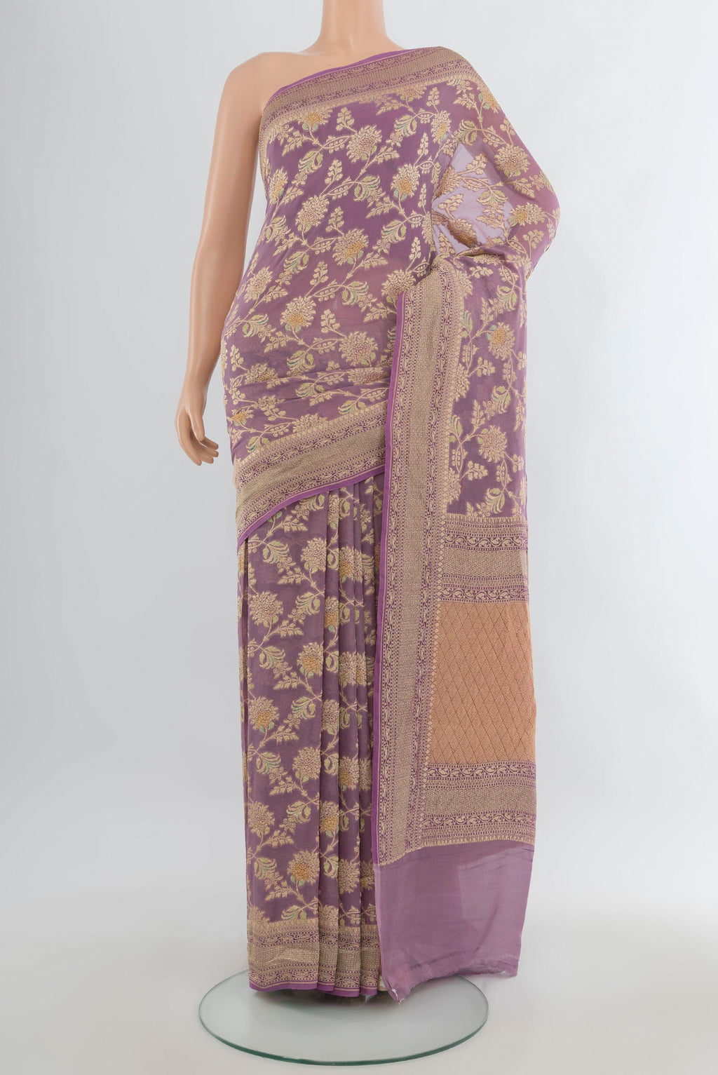 Lavender Banarasi Georgette Saree with Zari Brocade on the body and Zari Border.  displayed on a mannequin