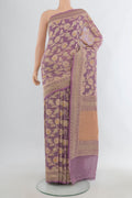 Lavender Banarasi Georgette Saree with Zari Brocade on the body and Zari Border.  displayed on a mannequin