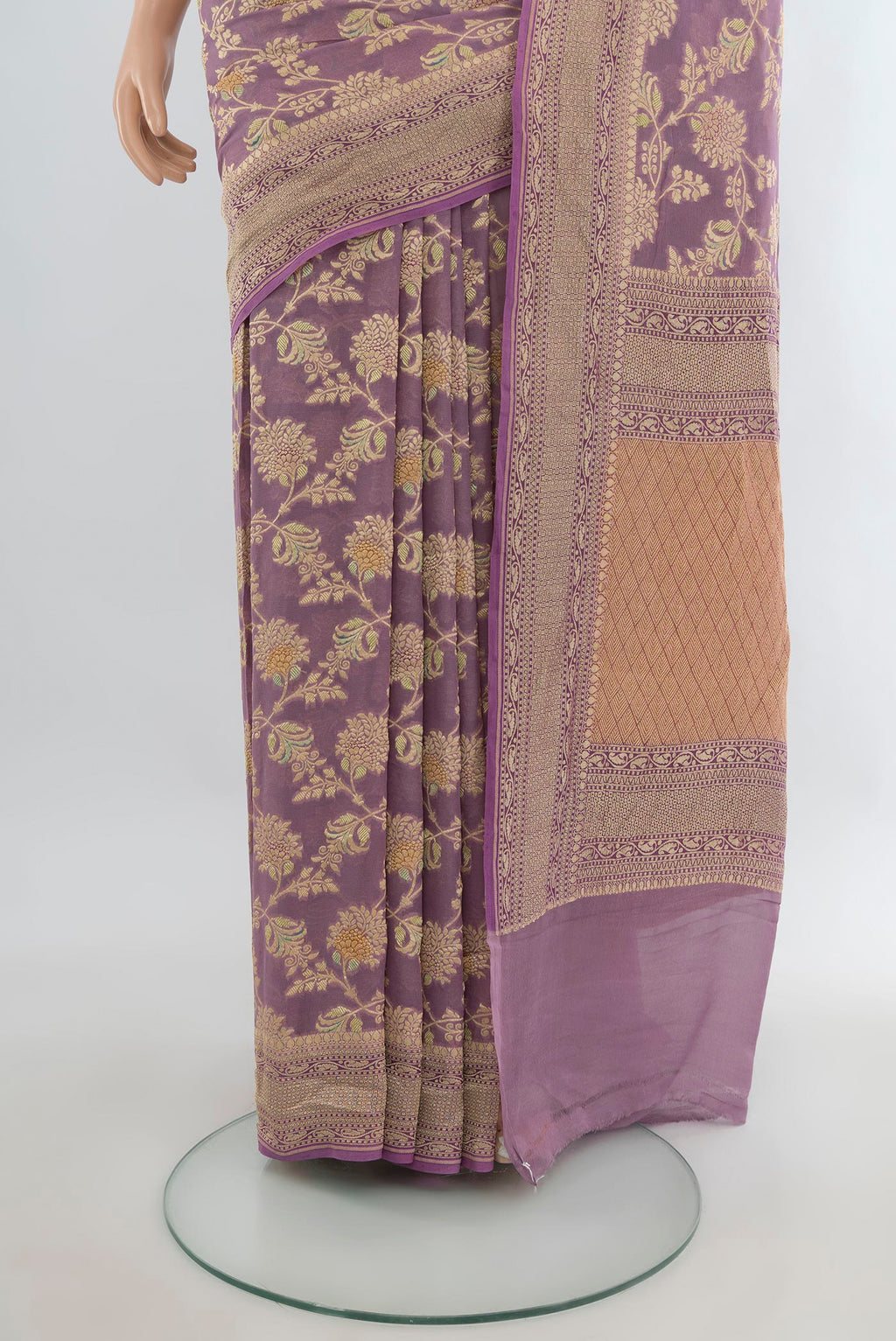 Pleats and pallu of Lavender Banarasi Georgette Saree with Zari Brocade on the body and Zari Border. 