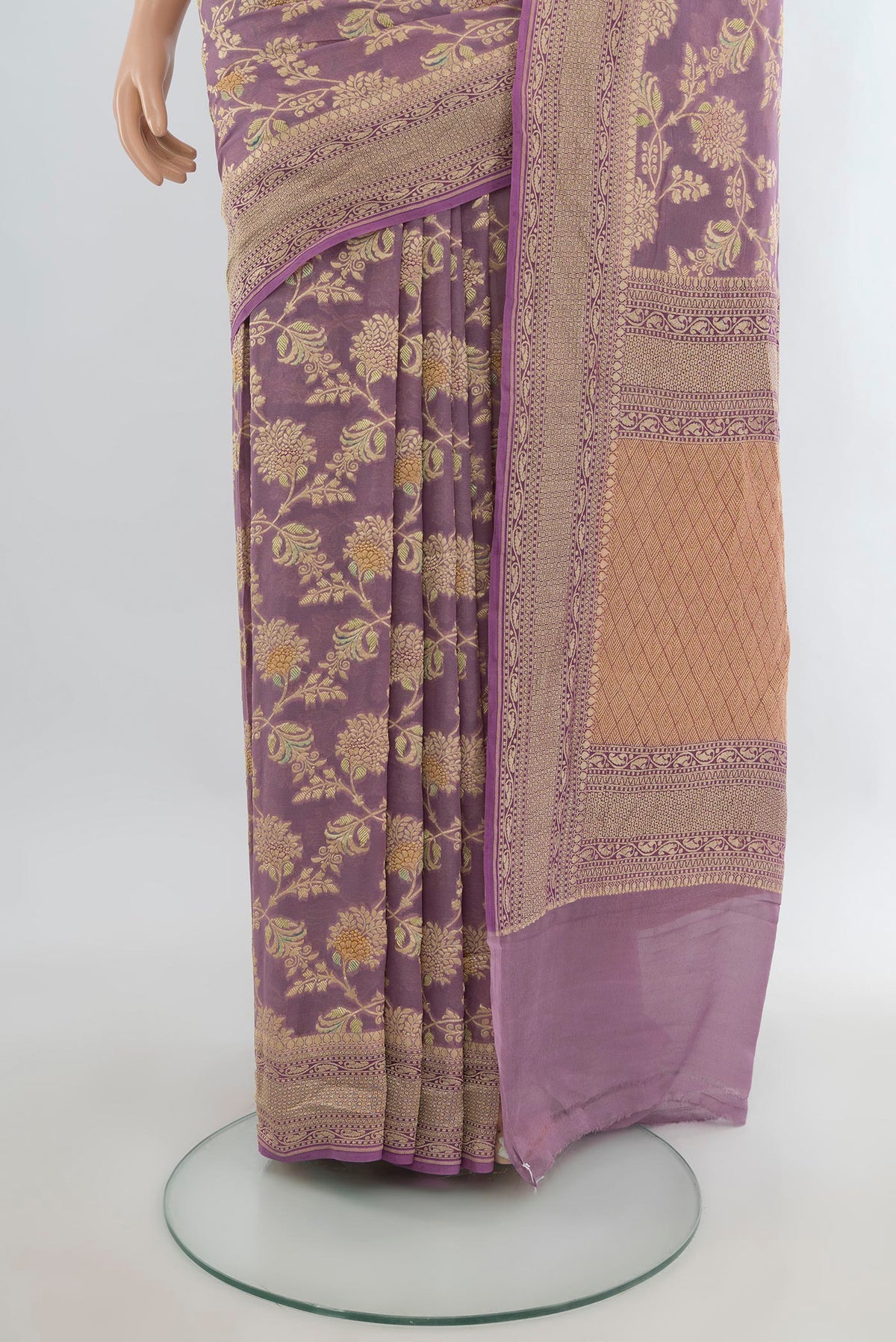 Pleats and pallu of Lavender Banarasi Georgette Saree with Zari Brocade on the body and Zari Border. 