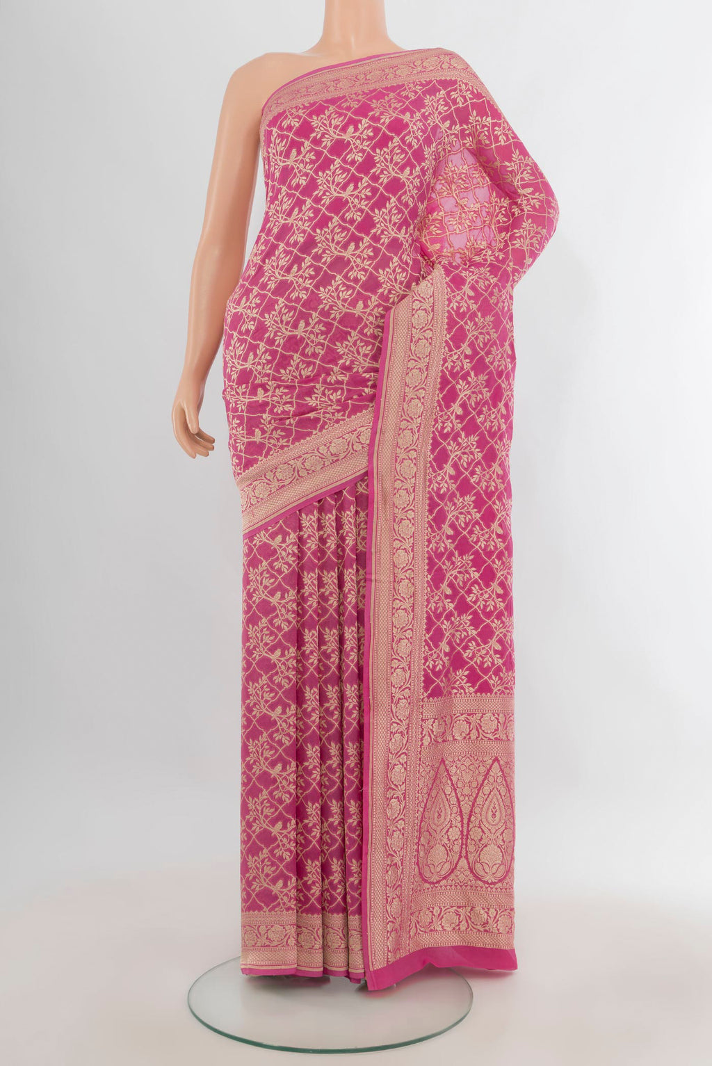 Pink Banarasi Georgette Saree with Zari Butta on the body and Zari Border.  displayed on a mannequin