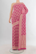Pink Banarasi Georgette Saree with Zari Butta on the body and Zari Border.  displayed on a mannequin