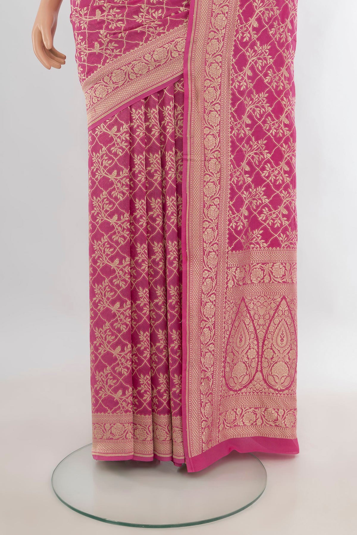 Pleats and pallu of Pink Banarasi Georgette Saree with Zari Butta on the body and Zari Border. 