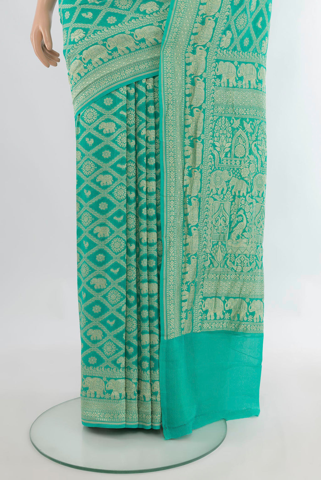 Pleats and pallu of Sea Green Banarasi Georgette Saree with Zari Brocade on the body and Zari Border. 