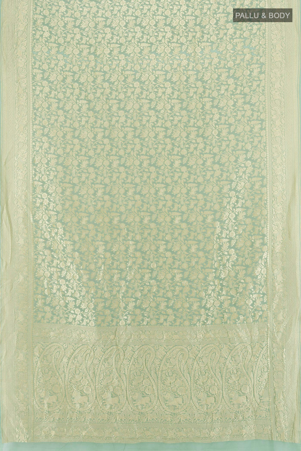 Flat view of Light Green Banarasi Georgette Saree with Zari Brocade on the body and Zari Border. 