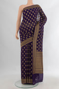 Navy Blue Banarasi Georgette Saree with Zari Butta on the body and Zari And Thread Border.  displayed on a mannequin
