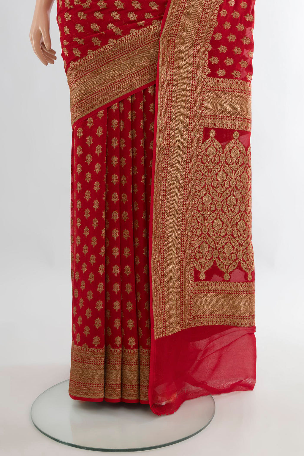 Pleats and pallu of Red Banarasi Georgette Saree with Zari Butta on the body and Zari Border. 