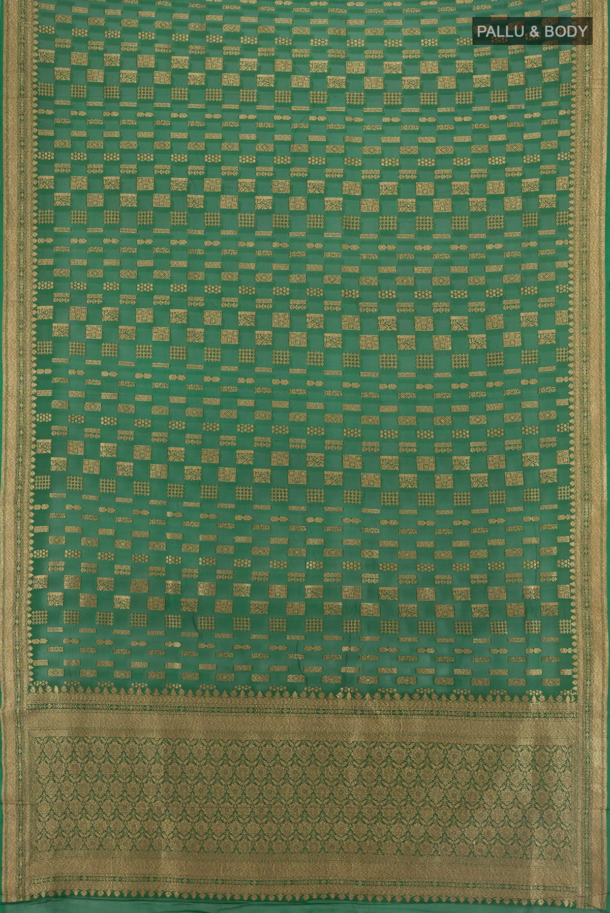 Flat view of Bottle Green Banarasi Georgette Saree with Zari Butta on the body and Zari Border. 