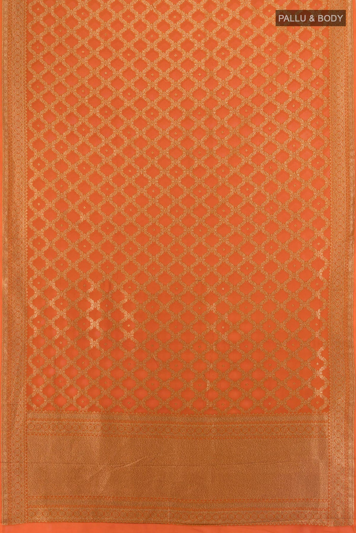 Flat view of Brick Orange Banarasi Georgette Saree with Zari Brocade on the body and Zari Border. 