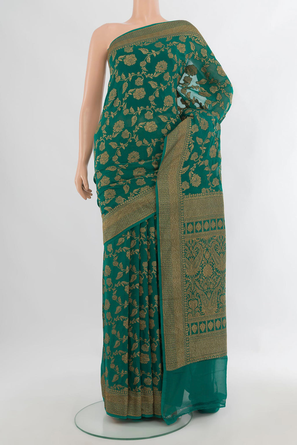 Sea Green Banarasi Georgette Saree with Zari Butta on the body and Zari Border.  displayed on a mannequin