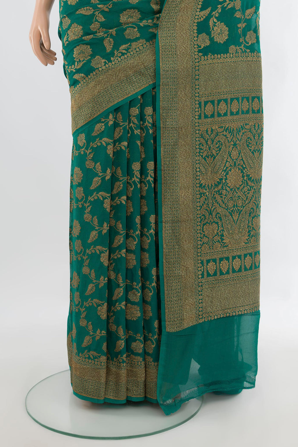 Pleats and pallu of Sea Green Banarasi Georgette Saree with Zari Butta on the body and Zari Border. 