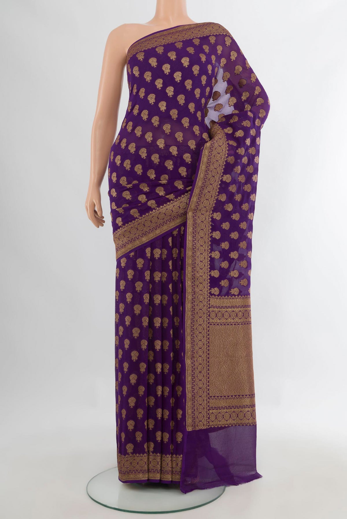 Violet Banarasi Georgette Saree with Zari Butta on the body and Zari Border.  displayed on a mannequin