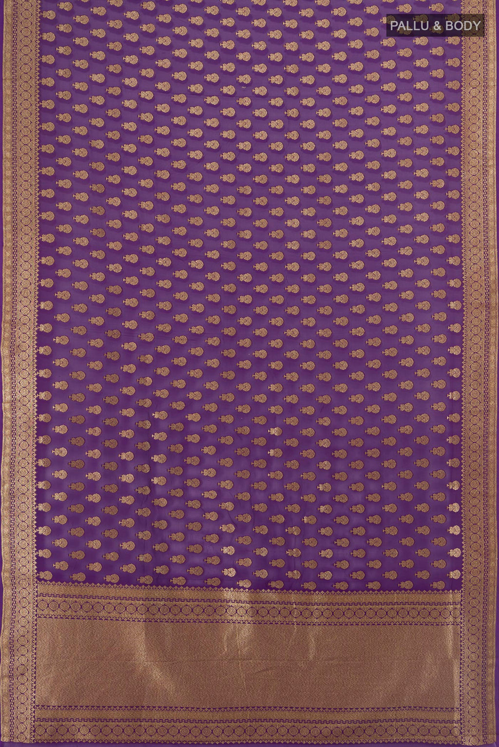 Flat view of Violet Banarasi Georgette Saree with Zari Butta on the body and Zari Border. 