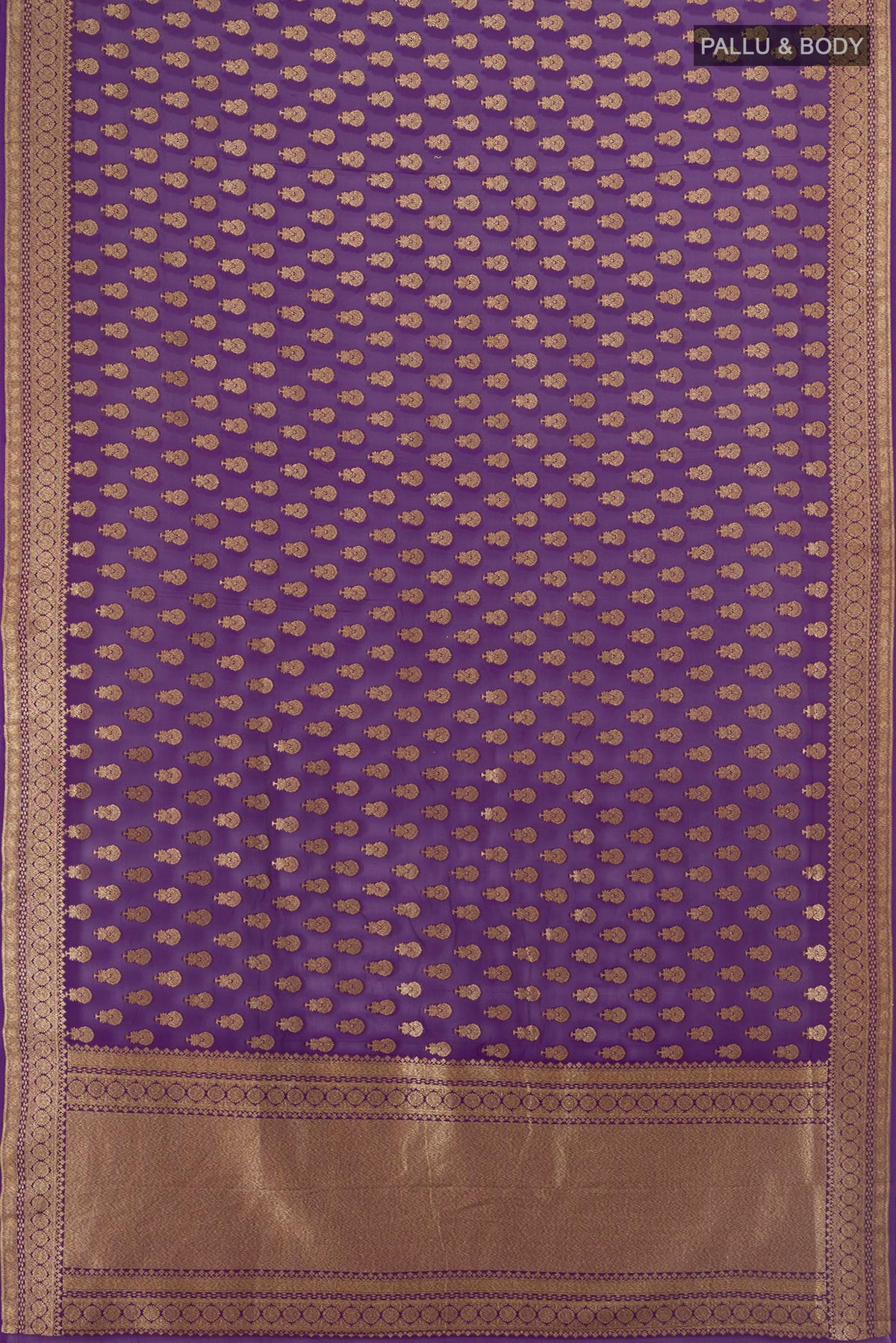 Flat view of Violet Banarasi Georgette Saree with Zari Butta on the body and Zari Border. 