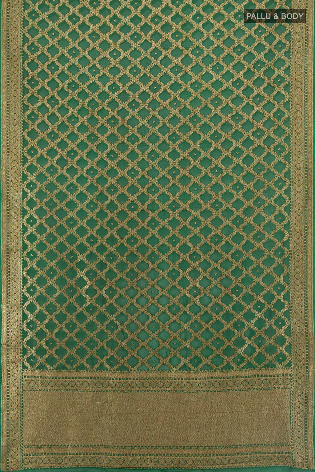 Flat view of Bottle Green Banarasi Georgette Saree with Zari Butta on the body and Zari Border. 