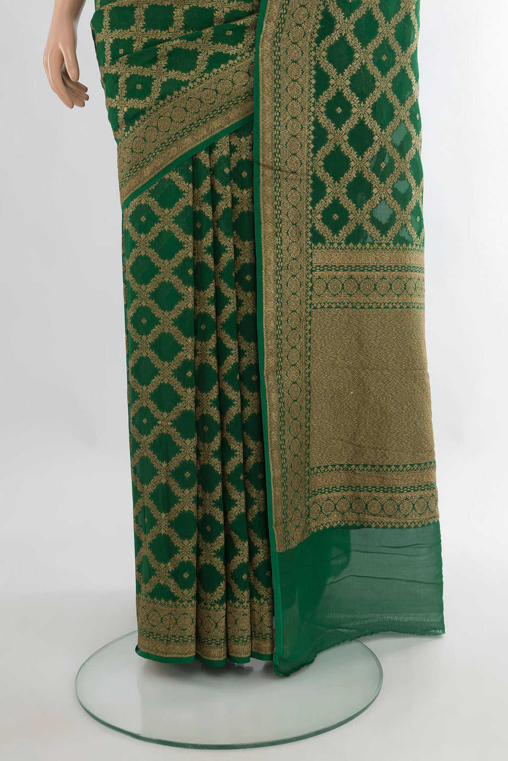 Pleats and pallu of Bottle Green Banarasi Georgette Saree with Zari Butta on the body and Zari Border. 