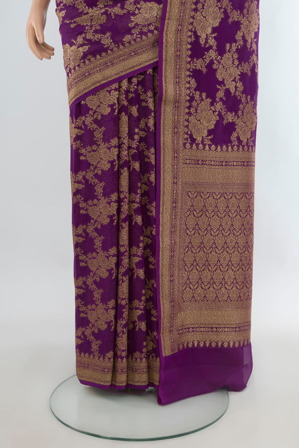 Pleats and pallu of Violet Banarasi Georgette Saree with Zari Brocade on the body and Zari Border. 