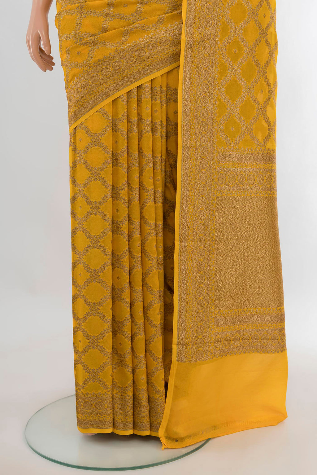 Pleats and pallu of Yellow Banarasi Georgette Saree with Checked design on the body and Zari Border. 