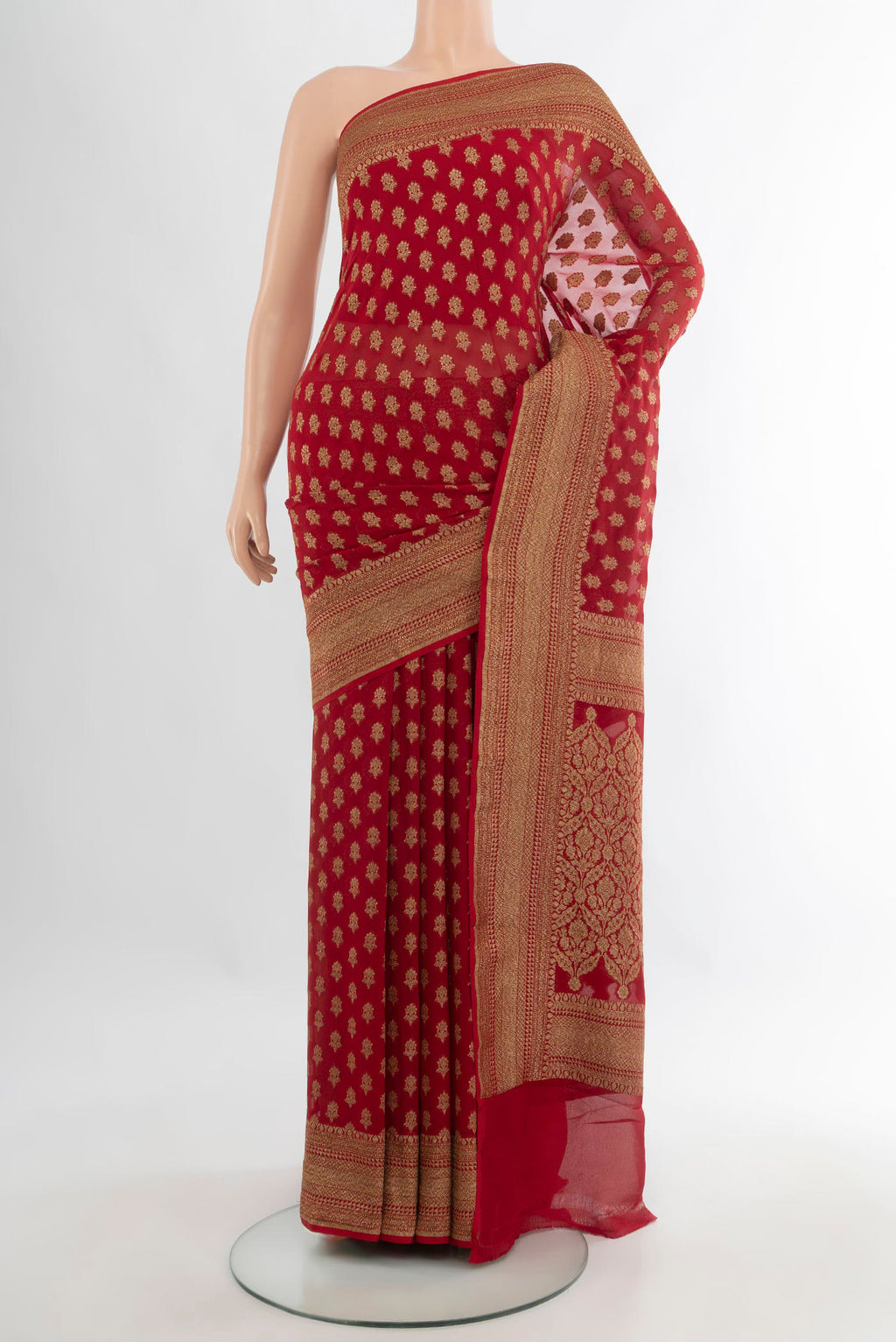 Red Banarasi Georgette Saree with Zari Butta on the body and Zari Border.  displayed on a mannequin
