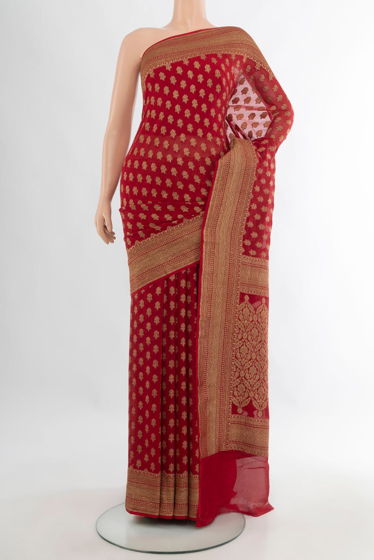 Red Banarasi Georgette Saree with Zari Butta on the body and Zari Border.  displayed on a mannequin
