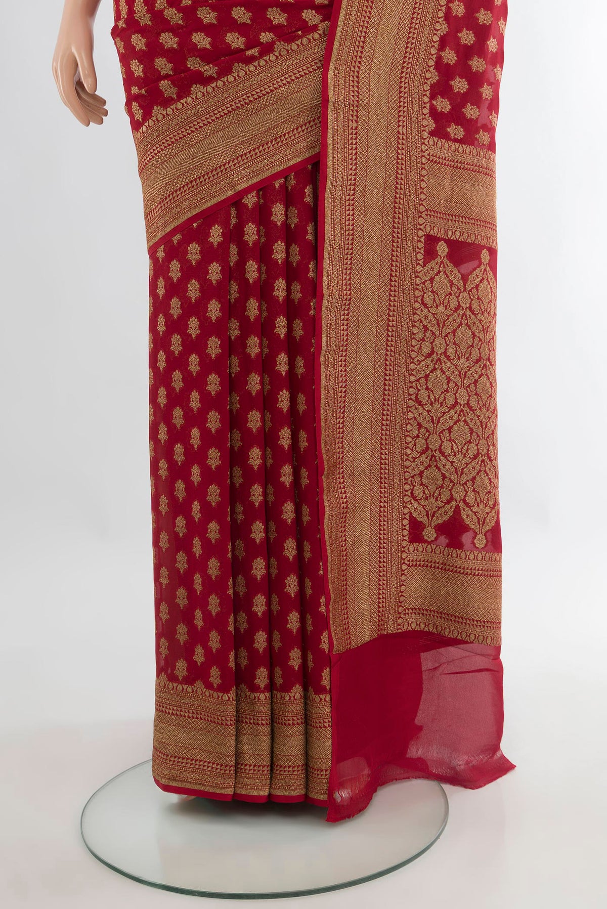 Pleats and pallu of Red Banarasi Georgette Saree with Zari Butta on the body and Zari Border. 