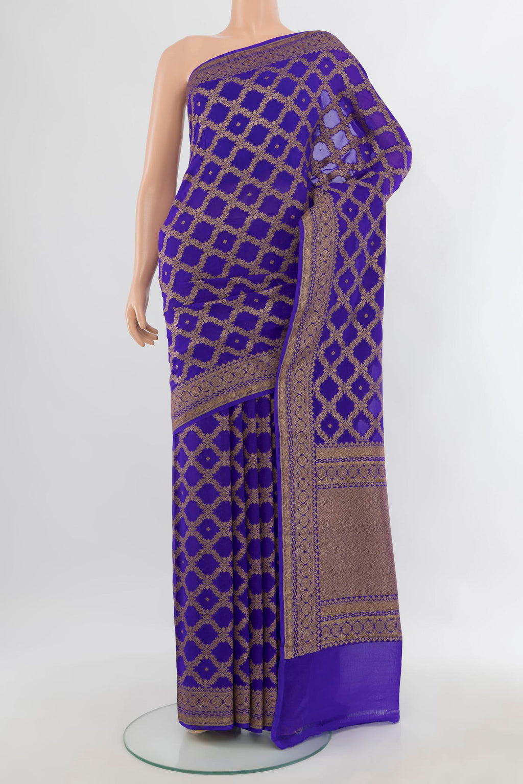 Royal Blue Banarasi Georgette Saree with Zari Butta on the body and Zari Border.  displayed on a mannequin