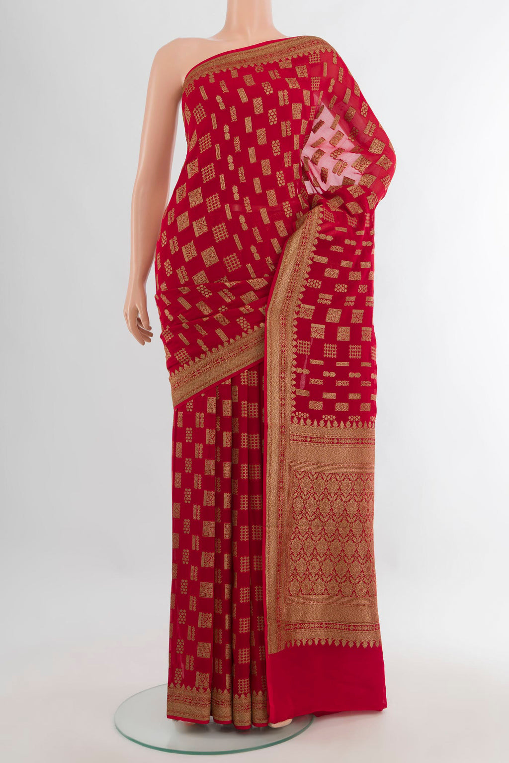 Red Banarasi Georgette Saree with Zari Butta on the body and Zari Border.  displayed on a mannequin