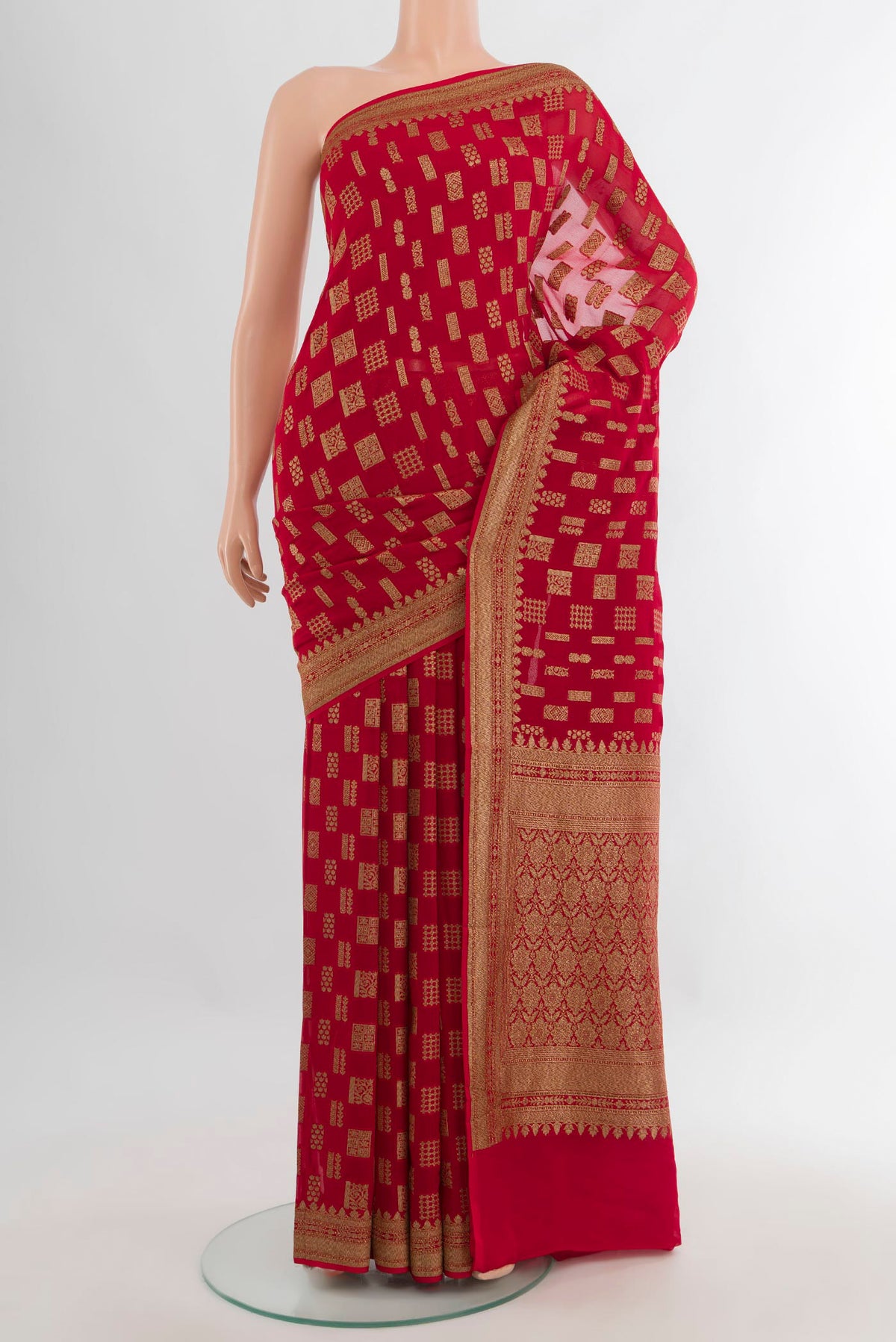 Red Banarasi Georgette Saree with Zari Butta on the body and Zari Border.  displayed on a mannequin