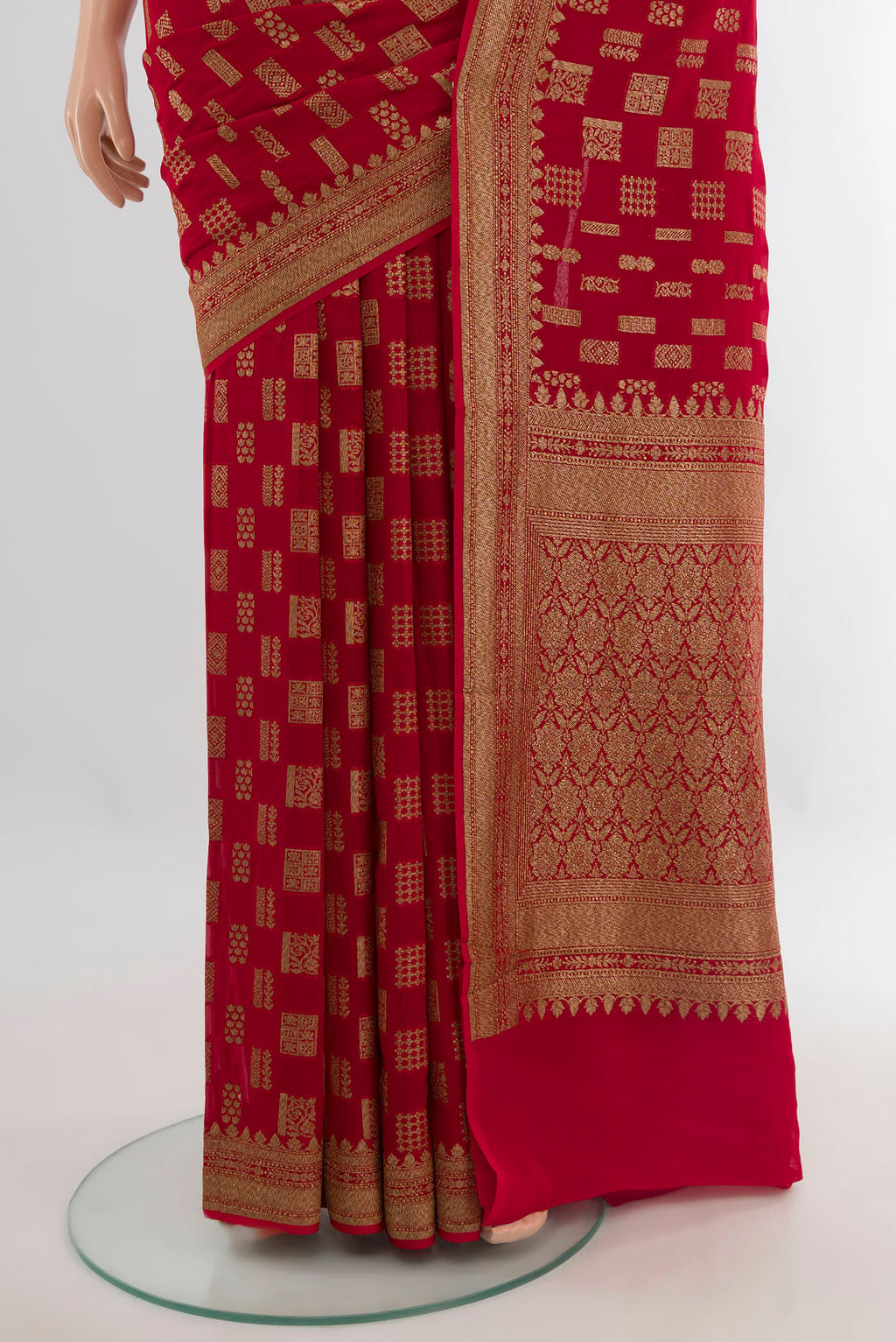 Pleats and pallu of Red Banarasi Georgette Saree with Zari Butta on the body and Zari Border. 