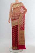 Multi Color Banarasi Georgette Saree with Zari Butta on the body and Zari Border.  displayed on a mannequin