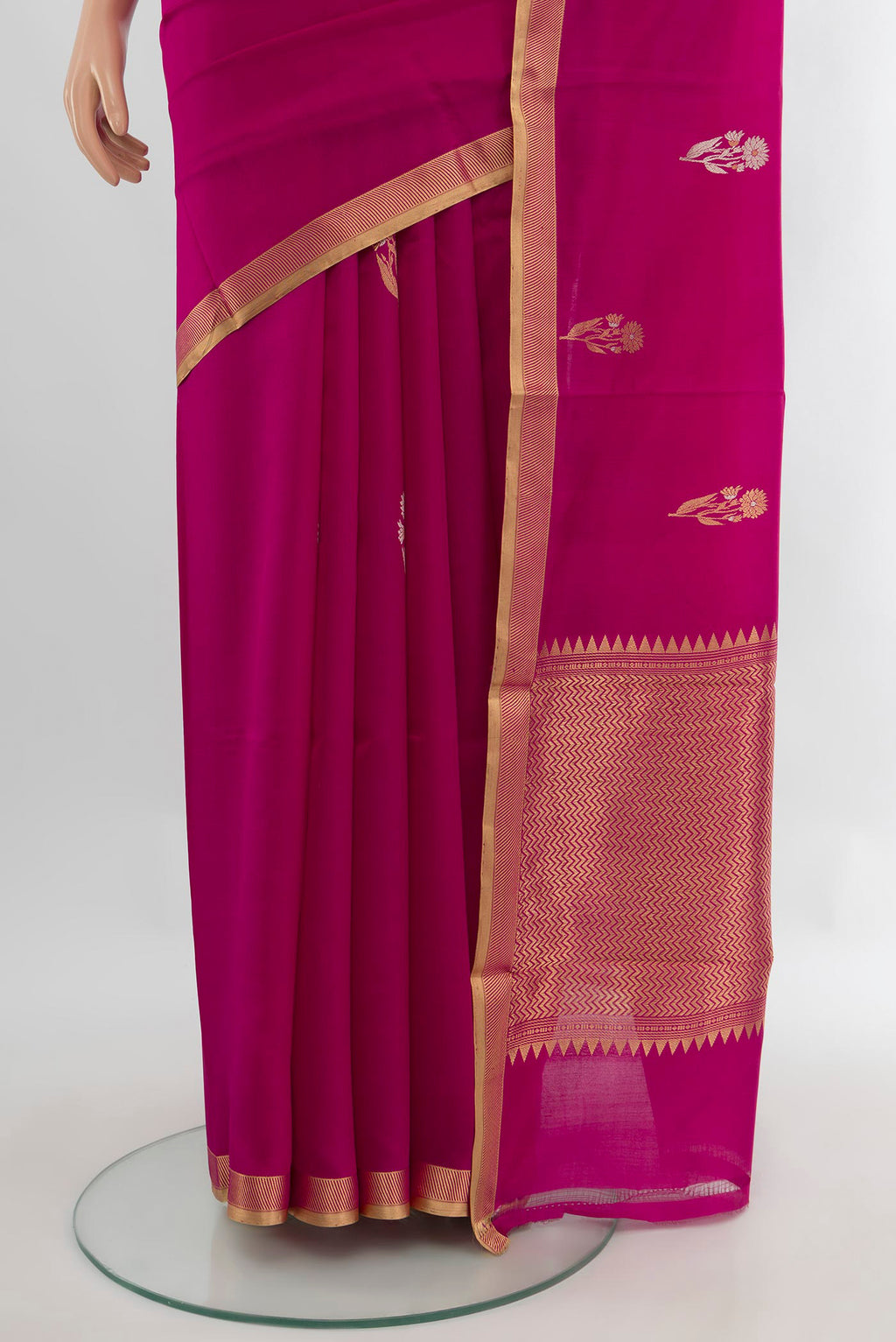 Pleats and pallu of Rani Pink Banarasi Katan Silk Saree with Zari Butta on the body and Zari Border. 