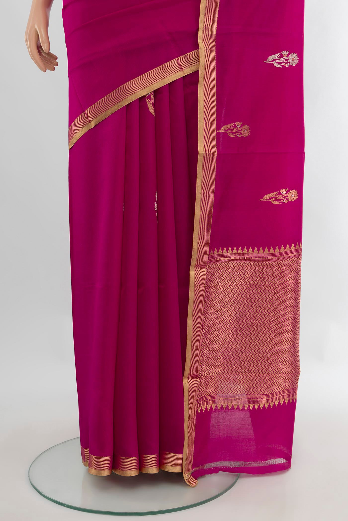 Pleats and pallu of Rani Pink Banarasi Katan Silk Saree with Zari Butta on the body and Zari Border. 