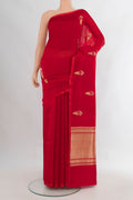 Pure Silk Red Banarasi Katan Saree with Zari Butta on the body and Without Border.  displayed on a mannequin